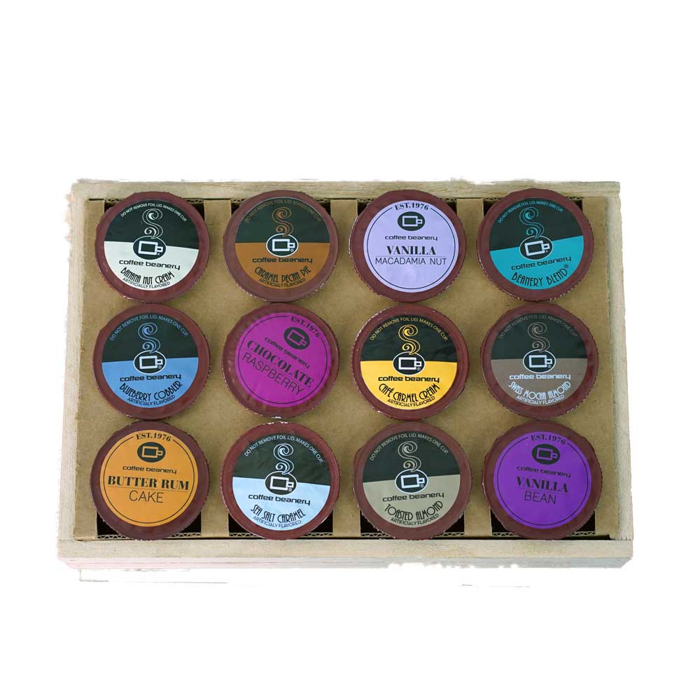 http://www.coffeebeanery.com/cdn/shop/files/coffee-beanery-coffee-gift-baskets-12-days-of-single-serve-pods-crate-29466680983652.jpg?v=1698744796